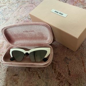 Authentic miu miu sunglasses brand new with box and case.